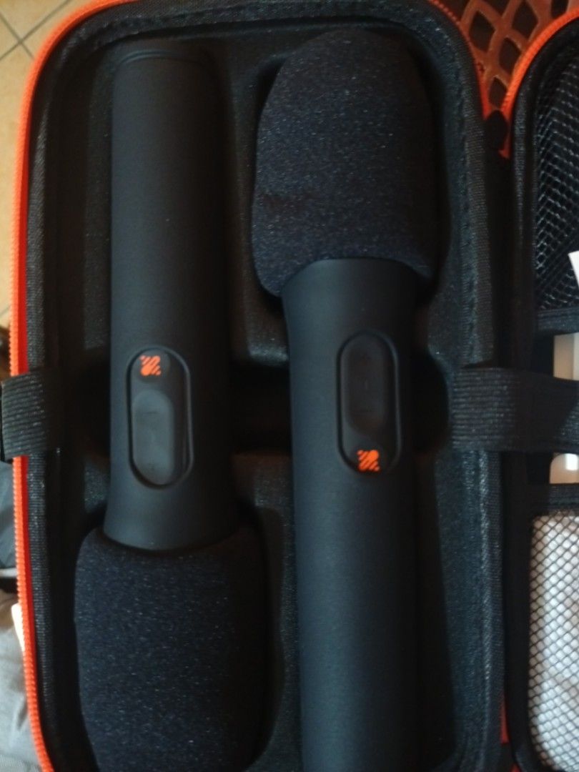 JBL Wireless Microphone Set with Case (Category: Microphones) located in Manila. Submitted by tenanboy (Listing ID 1465778199, Image 2). Description: - Brand: JBL Wireless Microphone Set (Black) - Inclusions: 2x handheld microphones, wireless receiver adapter, and custom black/red zipper hard case - Extras: Manuals and anti-rolling rings stored in the mesh pouch - Condition: Excellent / Ready to use - Ideal for: Karaoke nights, parties, and event