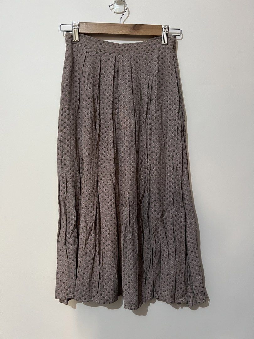 J.G. Hook Vintage Geometric Pattern Midi Skirt (Category: Skirts) located in San Juan, La Union. Submitted by jacquiqui (Listing ID 1465840179, Image 1). Description: - Brand: J.G. Hook - Style: Midi skirt with a high-waisted cut and gentle front pleats - Pattern: Muted purple and grey geometric print - Material: Lightweight, flowy fabric with clean inner lining.
