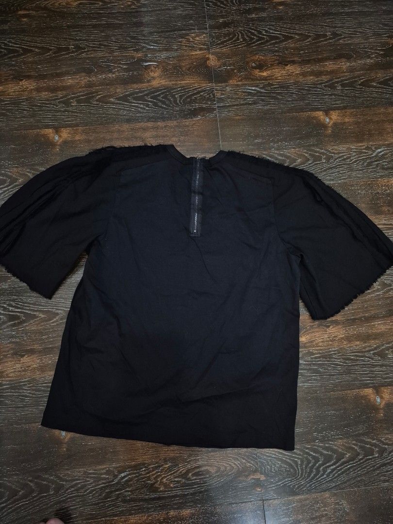 JNBY Black Puff sleeve blouse (Category: Blouses) located in Santa Cruz. Submitted by deenem (Listing ID 1465769301, Image 3). Description: Large on Tag Bust:19(38) inch Lenght:23 inch.