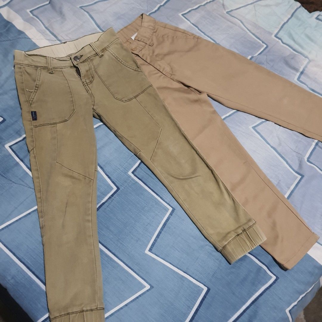 Jordan and JDN Co USA Khaki Pants Bundle (Category: Joggers) located in Tarlac. Submitted by jajubells (Listing ID 1465765222, Image 3). Description: - 2 pairs of versatile khaki trousers included - Made from durable, comfortable twill fabric - Pair 1 features a branded metal button and zipped pocket detail - Pair 2 displays a stylish contrast patch pocket with text embroidery - Neutral earth tone colors match easily with any top - Great everyday