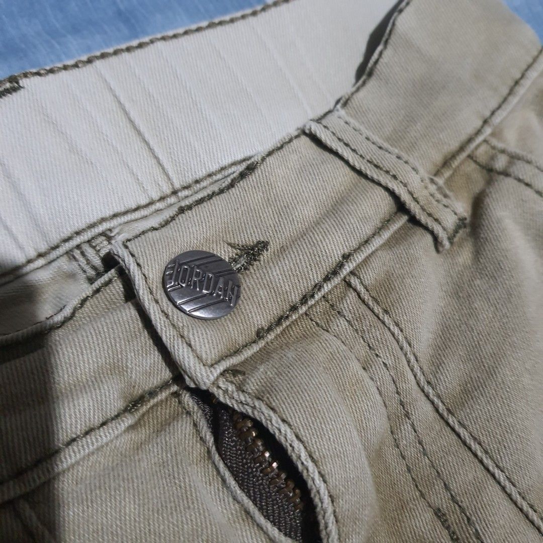 Jordan and JDN Co USA Khaki Pants Bundle (Category: Joggers) located in Tarlac. Submitted by jajubells (Listing ID 1465765222, Image 1). Description: - 2 pairs of versatile khaki trousers included - Made from durable, comfortable twill fabric - Pair 1 features a branded metal button and zipped pocket detail - Pair 2 displays a stylish contrast patch pocket with text embroidery - Neutral earth tone colors match easily with any top - Great everyday