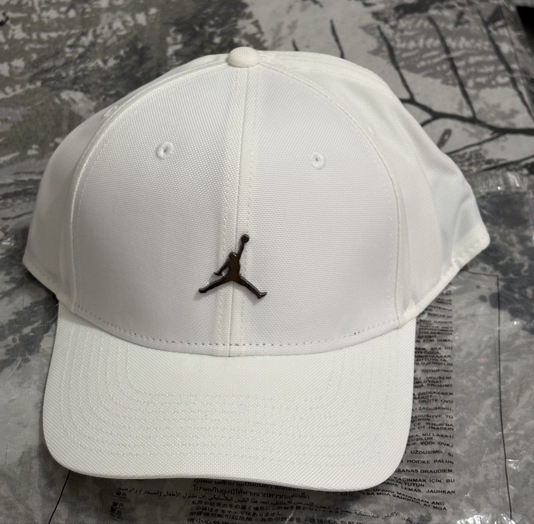 Jordan Rise Structured Metal Jumpman Hat S/M (Category: Caps & Hats) located in Manila. Submitted by shoepatos4u (Listing ID 1465890998, Image 1). Description: Durable woven nylon and a curved bill give this hat a traditional look. A metal Jumpman adds signature Jordan style you can wear day after day. Benefits Rise caps all have a roomy, modern fit with a high depth. The buckle closure helps give you an adjustable fit. Embroidered eyelets help a