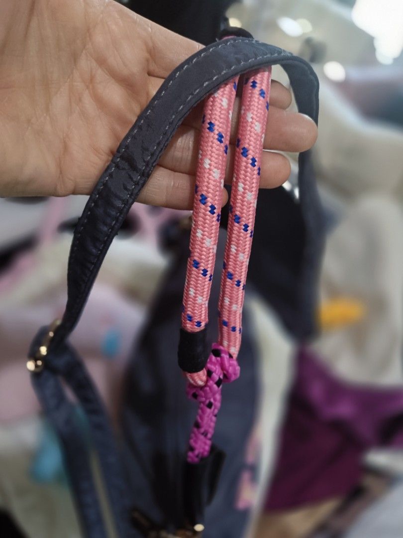 JTXS Embroidered Sling Bag (Category: Cross-body Bags) located in Bocaue. Submitted by bags.and.beyond (Listing ID 1465870278, Image 3). Description: ✨In gray color which features embroidered JTXS ✨In bright pink patterned rope handle & nylon adjustable long strap ✨nylon material ✨in pristine condition, good as new ✨payment first via gcash or bank transfer ✨delivery through lalamove & j&t.