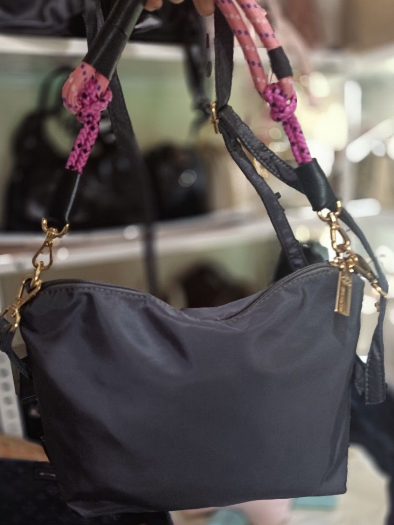 JTXS Embroidered Sling Bag (Category: Cross-body Bags) located in Bocaue. Submitted by bags.and.beyond (Listing ID 1465870278, Image 2). Description: ✨In gray color which features embroidered JTXS ✨In bright pink patterned rope handle & nylon adjustable long strap ✨nylon material ✨in pristine condition, good as new ✨payment first via gcash or bank transfer ✨delivery through lalamove & j&t.