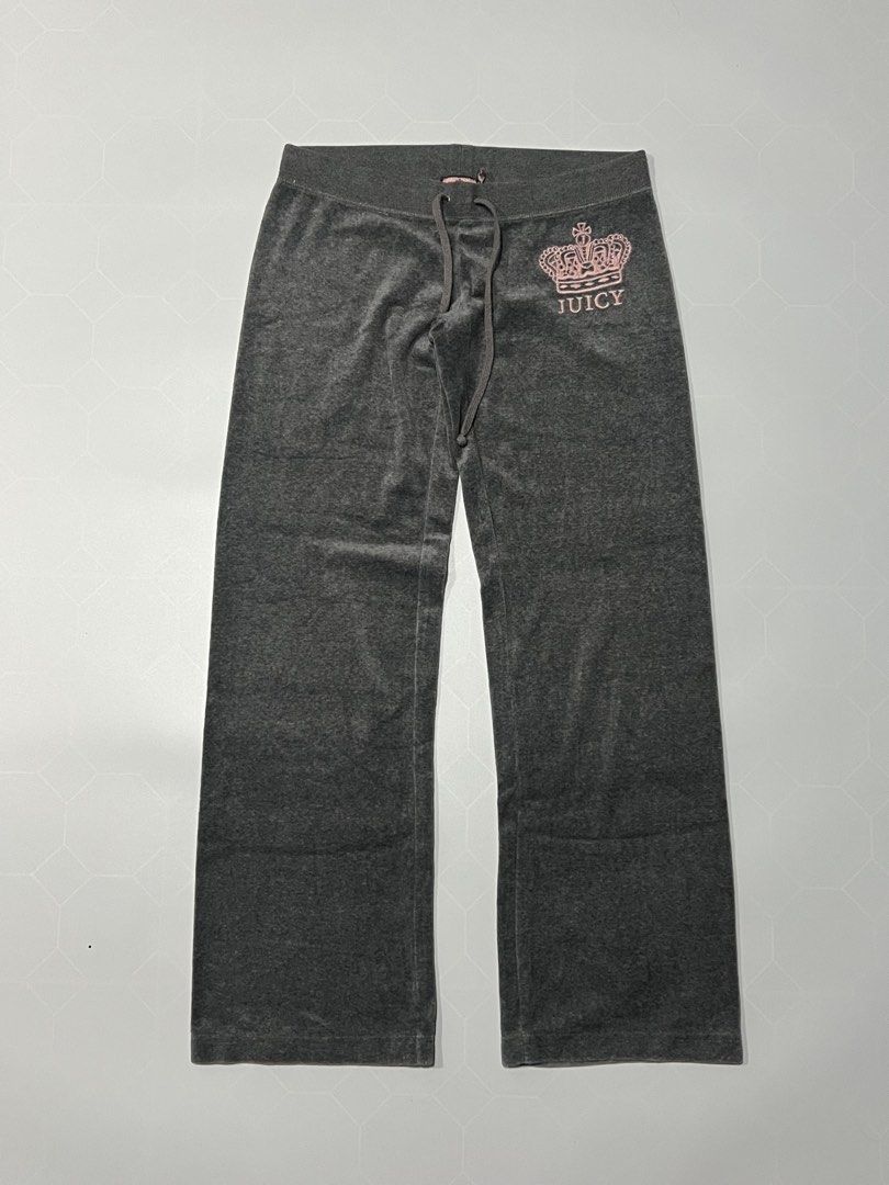 Juicy Couture Grey Velour Track Pants (Category: Joggers) located in Caloocan City. Submitted by lostarchive_55 (Listing ID 1465918135, Image 1). Description: - Brand: Juicy Couture - Color: Dark grey with pink crown and logo graphic - Size: Small (fits true to size) - Material: 80% cotton, 20% polyester velour blend - Fit: Classic relaxed fit with straight legs - Features: Adjustable drawstring waistband and hip pocket - Condition: Good pre-love