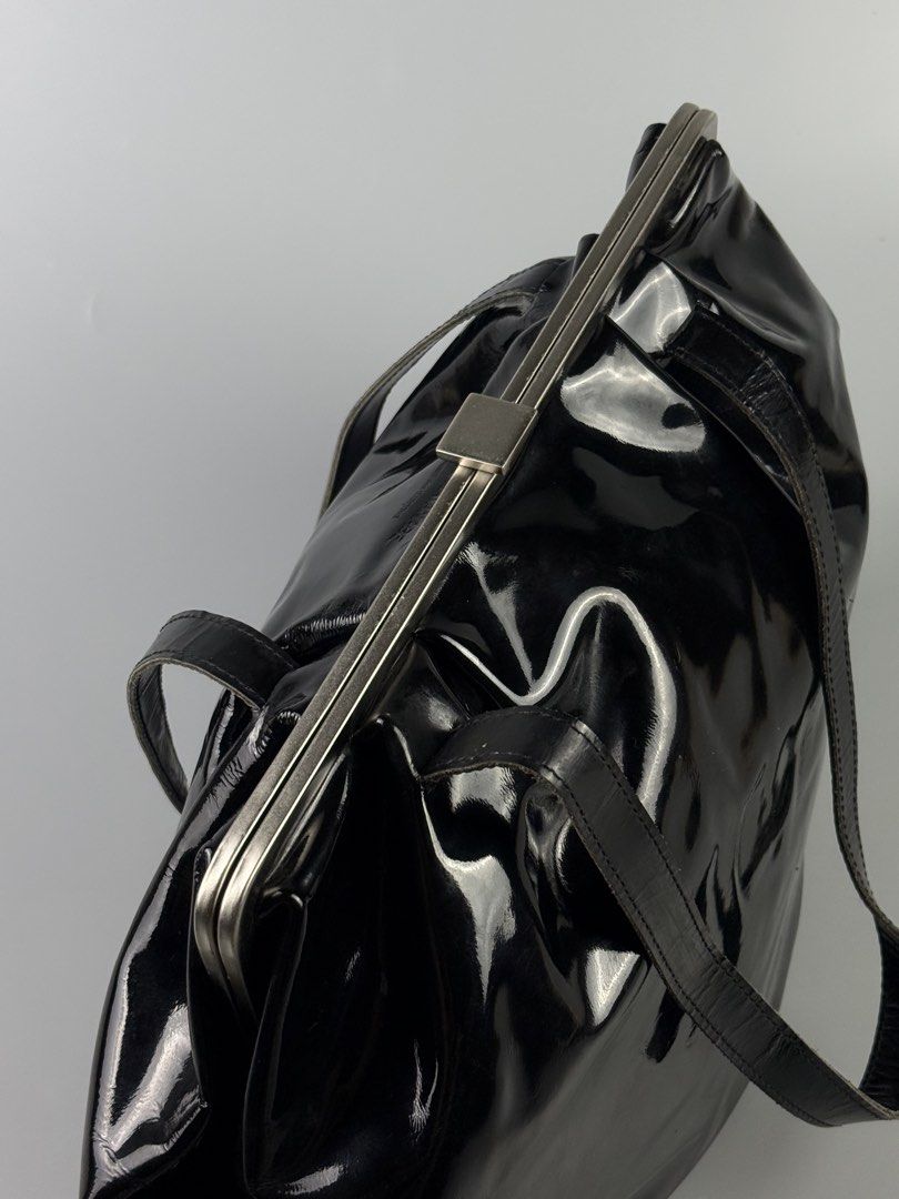 Junya Watanabe - Patent Leather Clasp Bag (Category: Shoulder Bags) located in Pasig City. Submitted by on_the_trend (Listing ID 1465792383, Image 3). Description: Condition: 9/10 Flaws: Normal creases, Patent fogging, Minor scuffs Made in: Japan Inclusion: None.