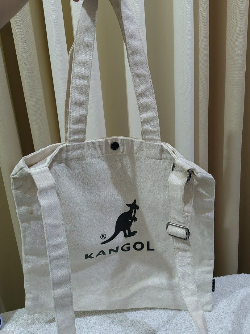 Kangol Canvas Tote Bag (Category: Tote Bags) located in Makati City. Submitted by prelovedtreatedwithlove (Listing ID 1465798964, Image 3). Description: - Authentic Kangol off-white canvas tote bag - Heavy-duty 100% cotton fabric, sturdy build for daily use - Large tote - Dual top handles and convenient adjustable shoulder strap - Issue: need wash, last pic for reference A-231.