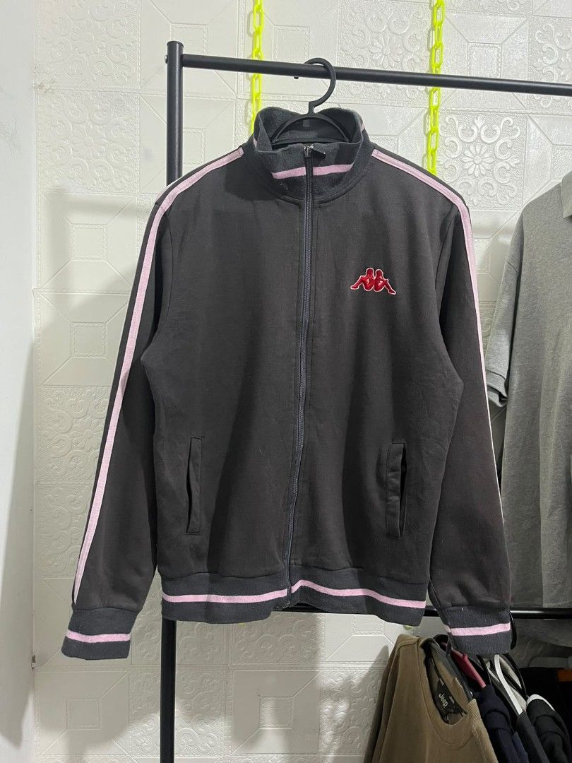 Kappa Track Jacket Charcoal Grey with Pink Stripes (Category: Coats, Jackets and Outerwear) located in Talavera. Submitted by jamiegenc (Listing ID 1465891877, Image 2). Description: - Brand: Kappa 24x20 - Color: Dark grey with pink piping and striped ribbed trim - Logo: Red embroidered Omini logo on the chest - Features: Full front zipper, stand-up collar, two front slash pockets - Material: Soft, comfortable fabric - Condition: Excellent pre-lo