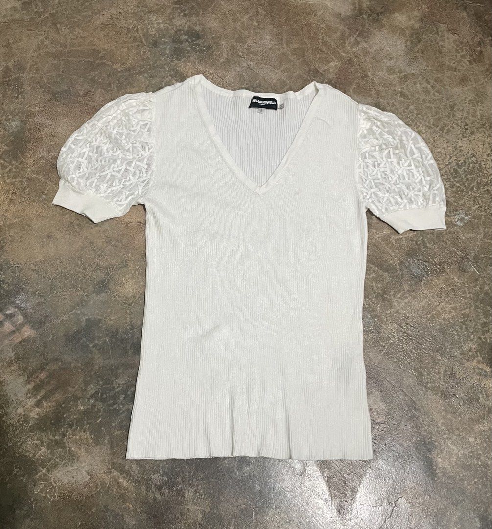 Karl Lagerfeld knit blouse (Category: Blouses) located in Davao. Submitted by mj_designervintagecurator (Listing ID 1465934852, Image 1). Description: 📌In good condition 📌best fit med to semi large 📌shoulder 14- bust 34- armpit 16- length 26 inches.