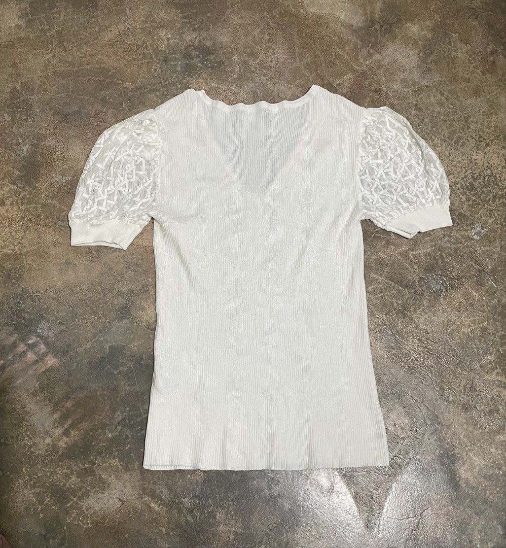 Karl Lagerfeld knit blouse (Category: Blouses) located in Davao. Submitted by mj_designervintagecurator (Listing ID 1465934852, Image 2). Description: 📌In good condition 📌best fit med to semi large 📌shoulder 14- bust 34- armpit 16- length 26 inches.