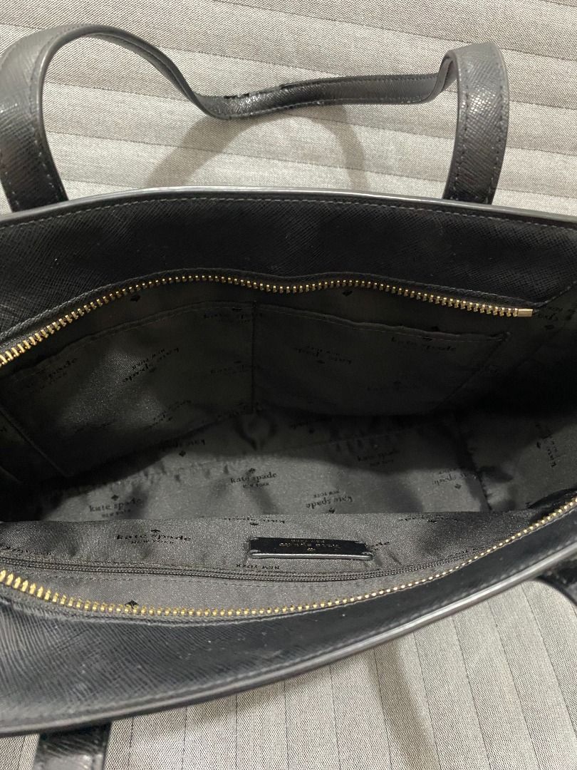 Kate Spade Staci Medium Tote in Black (Category: Tote Bags) located in Quezon City. Submitted by thedeclutterer_ (Listing ID 1465920292, Image 3). Description: Kate Spade Staci Medium Tote in Black - Excellent condition, rarely used - Only flaw: Very minimal tear in leather strap as shown in the photos - Negotiable price - Reason for selling: Decluttering for my Ate - Can provide additional photos and videos __________________________________ Shi