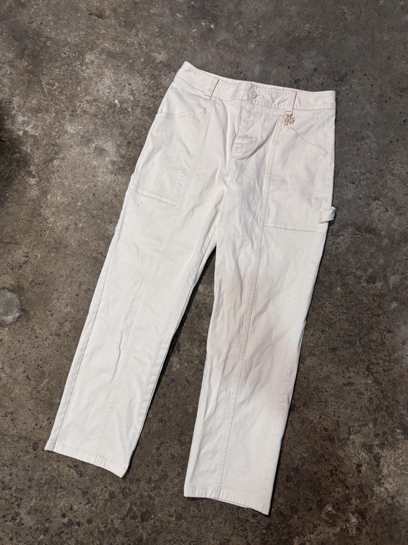 Kate Tw Bear White Cargo Pants with Charm (Category: Jeans) located in Pasig City. Submitted by dripthrift1600 (Listing ID 1465949555, Image 1). Description: - Brand: Kate Tw Bear - Color: White - Material: Corduroy texture all over - Fit: Straight leg - Features: Utility pockets, hammer loop at the back, branded button closure, and a removable TW metal charm on the front belt loop - Condition: Noticeable staining near the lower right leg - Dimes