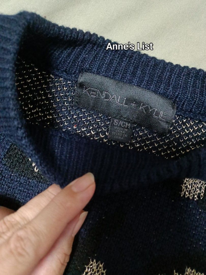 Kendall + Kylie Navy Blue Leopard Pattern Sweater S/M (Category: Coats, Jackets and Outerwear) located in Santa Maria. Submitted by anne_s.list (Listing ID 1465940618, Image 1). Description: - Brand: Kendall + Kylie - Color: Navy blue with all-over leopard pattern and metallic threading - Material: Acrylic and polyester knit - Size: Tagged S/CH (fits S to M comfortably) - Measurements: 20 inches chest width - Details: Crew neckline, long sleeves 