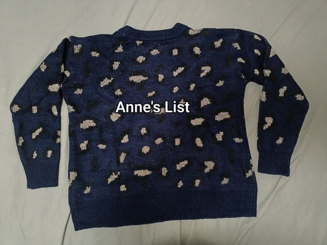 Kendall + Kylie Navy Blue Leopard Pattern Sweater S/M (Category: Coats, Jackets and Outerwear) located in Santa Maria. Submitted by anne_s.list (Listing ID 1465940618, Image 3). Description: - Brand: Kendall + Kylie - Color: Navy blue with all-over leopard pattern and metallic threading - Material: Acrylic and polyester knit - Size: Tagged S/CH (fits S to M comfortably) - Measurements: 20 inches chest width - Details: Crew neckline, long sleeves 