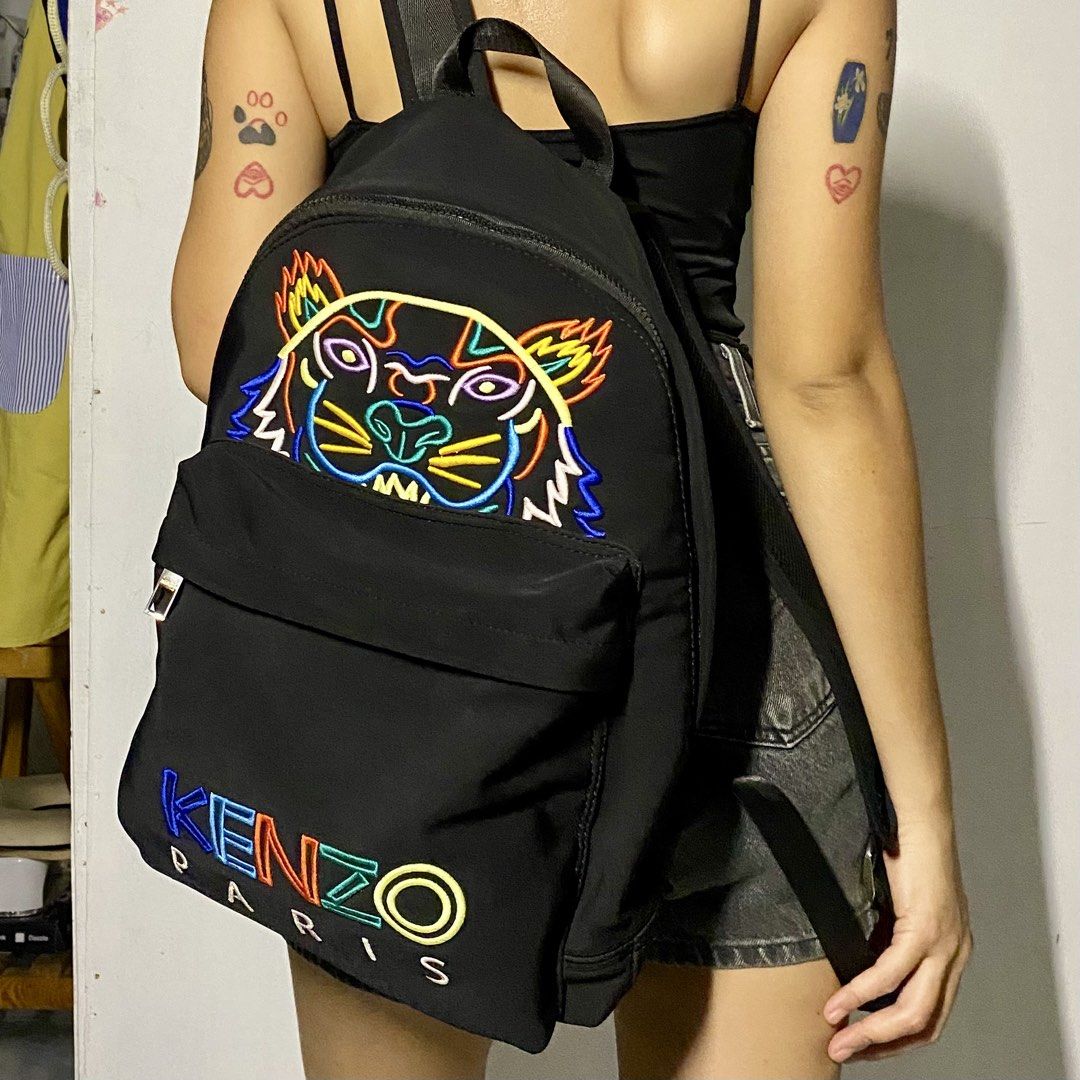 Kenzo Tiger Neoprene Neon Backpack (Category: Backpacks) located in San Fernando. Submitted by zpoilednamilk (Listing ID 1465890332, Image 2). Description: - Material: Neoprene - Condition: Good overall, but has a small tear near the top handle seam that requires repair.