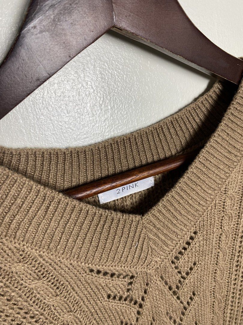 Khaki cable knit vest (Category: Others Tops) located in Makati City. Submitted by indaysukaycloset (Listing ID 1465816795, Image 3). Description: KHAKI CABLE KNIT VEST Brand: 2PINK (Japan Brand) Size: L on tag - Fits M-L Color: Khaki / Camel Brown / Mocha Details: - W-18.5 L-21 (laid flat, in inches) - Bust 86~94cm / Height 154~162cm (from tag) - V-neck sleeveless knit vest - Eyelet / pointelle pattern center + cable knit details - Ribbed neckli