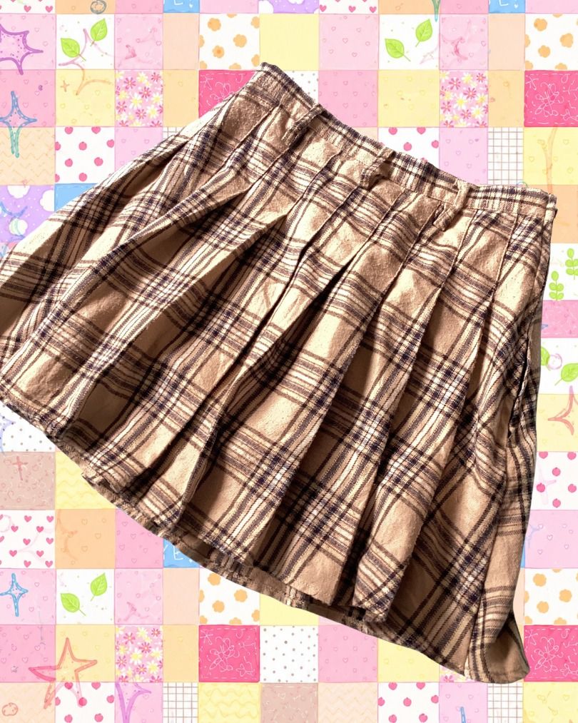 khaki chic tan & brown pleated mini skirt (Category: Skirts) located in Cavite. Submitted by 1barbiedoll (Listing ID 1465934673, Image 2). Description: small to medium (23-26).