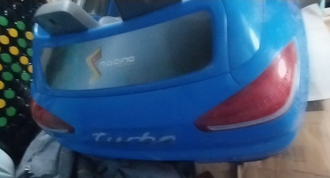 Kids motor car (Category: Infant Playtime) located in Quezon City. Submitted by eastwood22 (Listing ID 1465783619, Image 2). Description: - didnt use much. used to put diapers. only indoor - handle broken-can drive with remocon - door open.close.lock - head.tail lamp on. console led(most car has no led lighting. only sticker console). starting motor sound - batt diacharged. so need 2 replace. about 1,200ps at alimall - 3 speed - brand new 12k - s