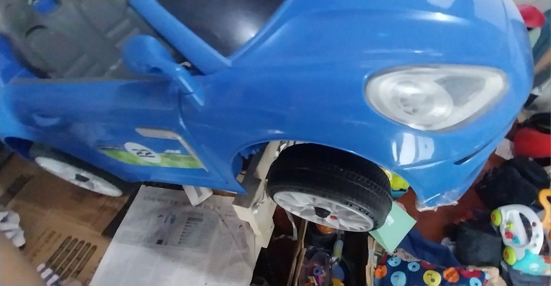 Kids motor car (Category: Infant Playtime) located in Quezon City. Submitted by eastwood22 (Listing ID 1465783619, Image 3). Description: - didnt use much. used to put diapers. only indoor - handle broken-can drive with remocon - door open.close.lock - head.tail lamp on. console led(most car has no led lighting. only sticker console). starting motor sound - batt diacharged. so need 2 replace. about 1,200ps at alimall - 3 speed - brand new 12k - s
