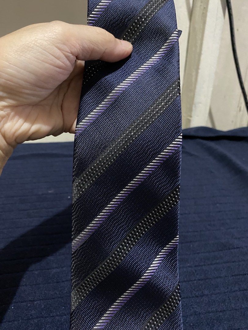 Kissa Navy Blue Stripe Microfiber Necktie (Category: Ties) located in Manila. Submitted by resi.diaz (Listing ID 1465894260, Image 2). Description: - Brand: Kissa - Color: Navy blue with black and purple diagonal stripes - Material: 100% smooth microfiber - Width: Standard - Condition: Clean and ready to wear - Ideal for: Formal events, office wear, and business meetings.
