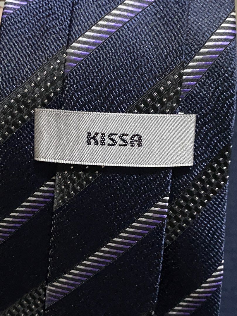 Kissa Navy Blue Stripe Microfiber Necktie (Category: Ties) located in Manila. Submitted by resi.diaz (Listing ID 1465894260, Image 3). Description: - Brand: Kissa - Color: Navy blue with black and purple diagonal stripes - Material: 100% smooth microfiber - Width: Standard - Condition: Clean and ready to wear - Ideal for: Formal events, office wear, and business meetings.