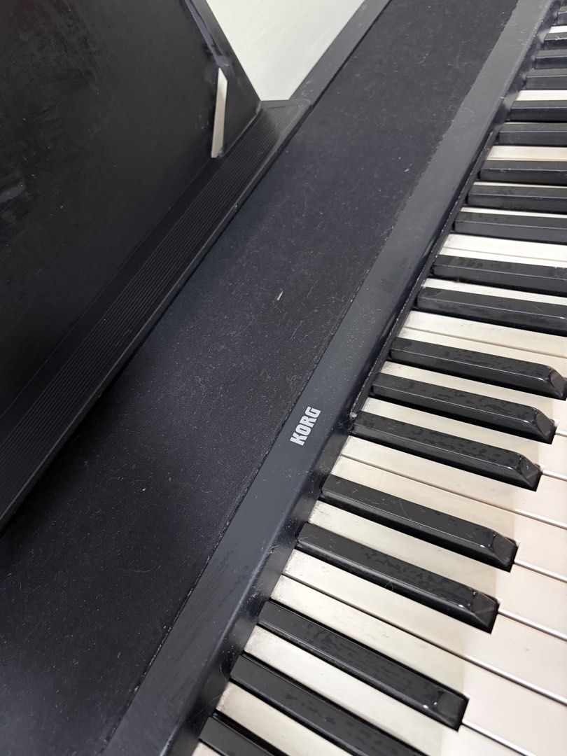 Korg Digital Piano Keyboard (Category: Musical Instruments) located in Pasig City. Submitted by cia0431 (Listing ID 1465821936, Image 1). Description: - Brand: Korg digital piano - Keys: Standard 88-key layout (black and white) - Condition: There's some issues with the keys. - Features: Includes integrated music rest stand at the back - Perfect for: Daily practice sessions and home use As is. Pagawa nyo nalang po..