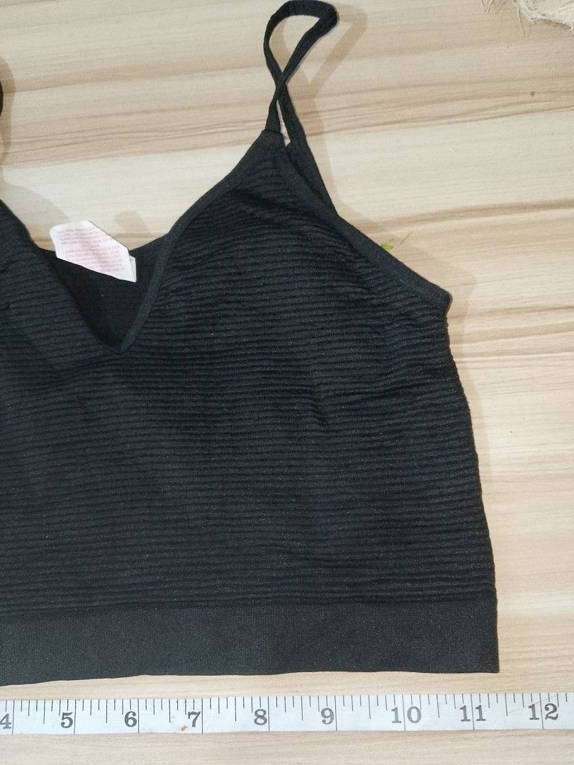 L: black horizontal ribbed bra no pads (Category: Undergarments & Loungewear) located in Manila. Submitted by truecrystal-1407 (Listing ID 1465947743, Image 2). Description: check measurement in photo.