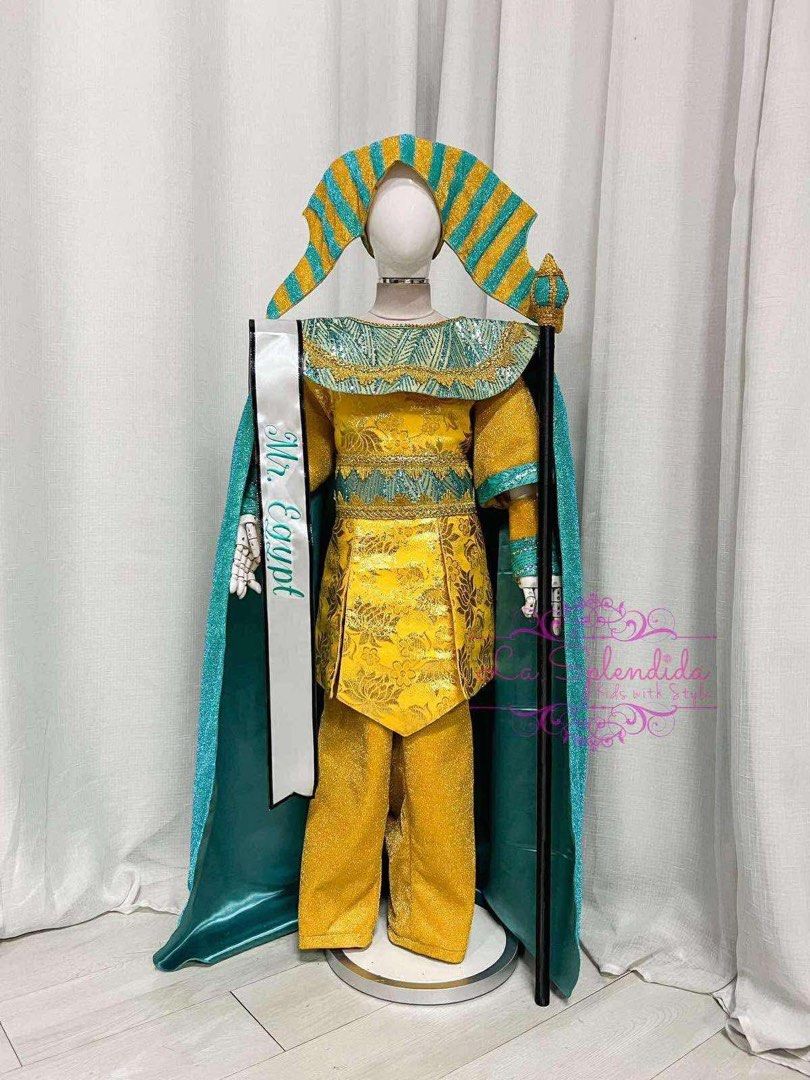 La Splendida Mr Egypt S7 (Category: Babies & Kids Fashion) located in Makati City. Submitted by andiecastro (Listing ID 1465785121, Image 1). Description: - Complete Pharaoh costume set for kids - Eye-catching bright yellow and turquoise metallic patterned top and pants - Includes matching striped headpiece, dramatic long cape, staff, and 'Mr. Egypt' sash - Ideal for school pageants, United Nations Day events, and costume parties - Brand new and 