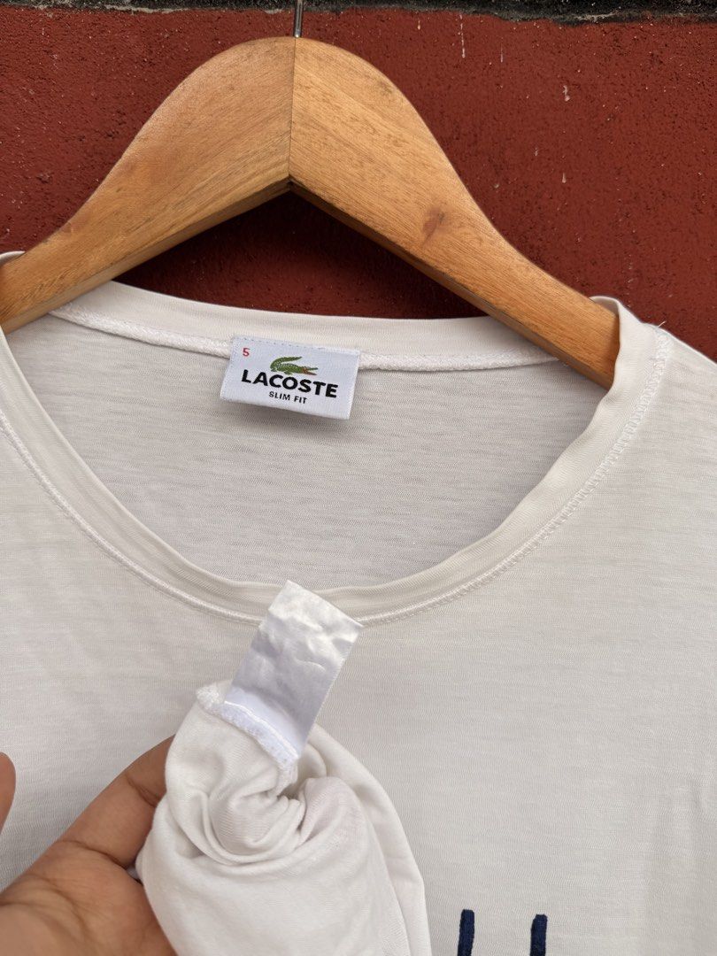 Lacoste (Category: Tshirts & Polo Shirts ) located in Baguio. Submitted by mardimercredi14 (Listing ID 1465847556, Image 3). Description: 🔥 Lacoste Dimensions: 21*28 Condition: very good Color Rate: 10 ❌ sign of usage ❌ needs laundry .