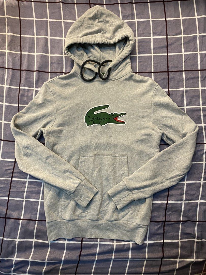 Lacoste big logo hoodie (Category: Coats, Jackets and Outerwear) located in Cebu City. Submitted by ahuk_sa_ukay (Listing ID 1465919422, Image 2). Description: Lacoste hoodie big logo Size on tag: 2 small Color rate: 9.5/10 Condition: picture details scratch sa may bandang liston sa liog Dm for more details.