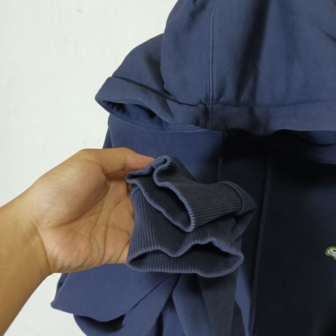 Lacoste Hoodie (Category: Coats, Jackets and Outerwear) located in Marawi City. Submitted by rajieeee (Listing ID 1465892259, Image 2). Description: SALE ‼️500 ONLY‼️ Very Good Condition Color rate 9.5/10 24 by 27 Authentic 💯 Issue : See last pic.