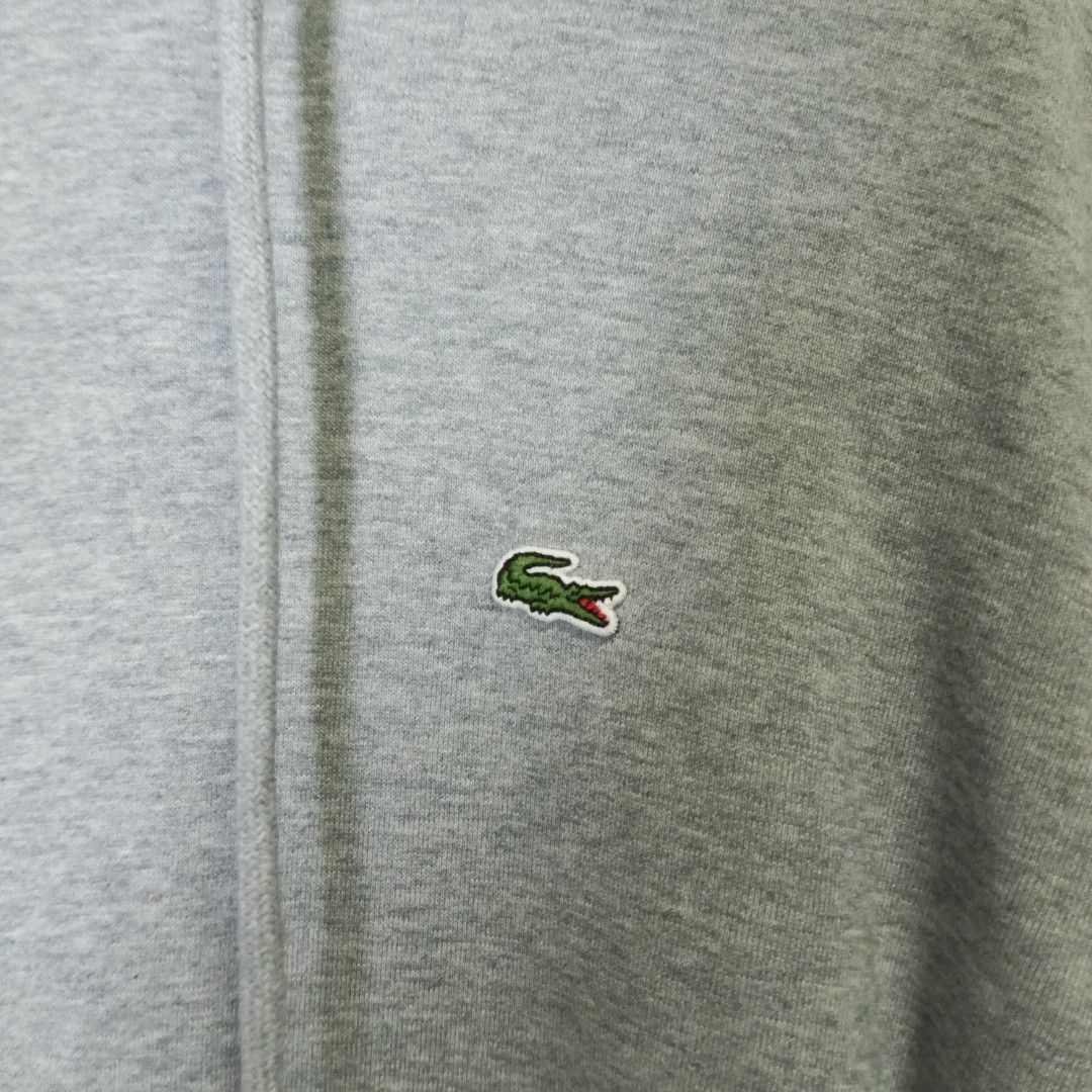 Lacoste Hoodie Gray (Category: Coats, Jackets and Outerwear) located in Marawi City. Submitted by rajieeee (Listing ID 1465887424, Image 2). Description: SALE ‼️500 ONLY‼️ Good Condition Color rate 9.5/10 Authentic 💯 22 by 28 Issue : See last 4 pictures ( easy to repair).