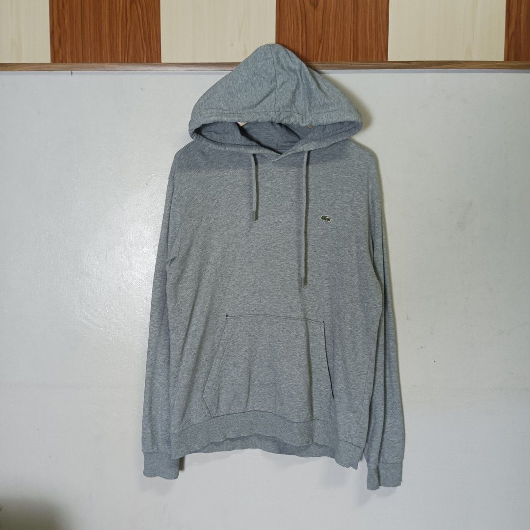 Lacoste Hoodie Gray (Category: Coats, Jackets and Outerwear) located in Marawi City. Submitted by rajieeee (Listing ID 1465887424, Image 1). Description: SALE ‼️500 ONLY‼️ Good Condition Color rate 9.5/10 Authentic 💯 22 by 28 Issue : See last 4 pictures ( easy to repair).