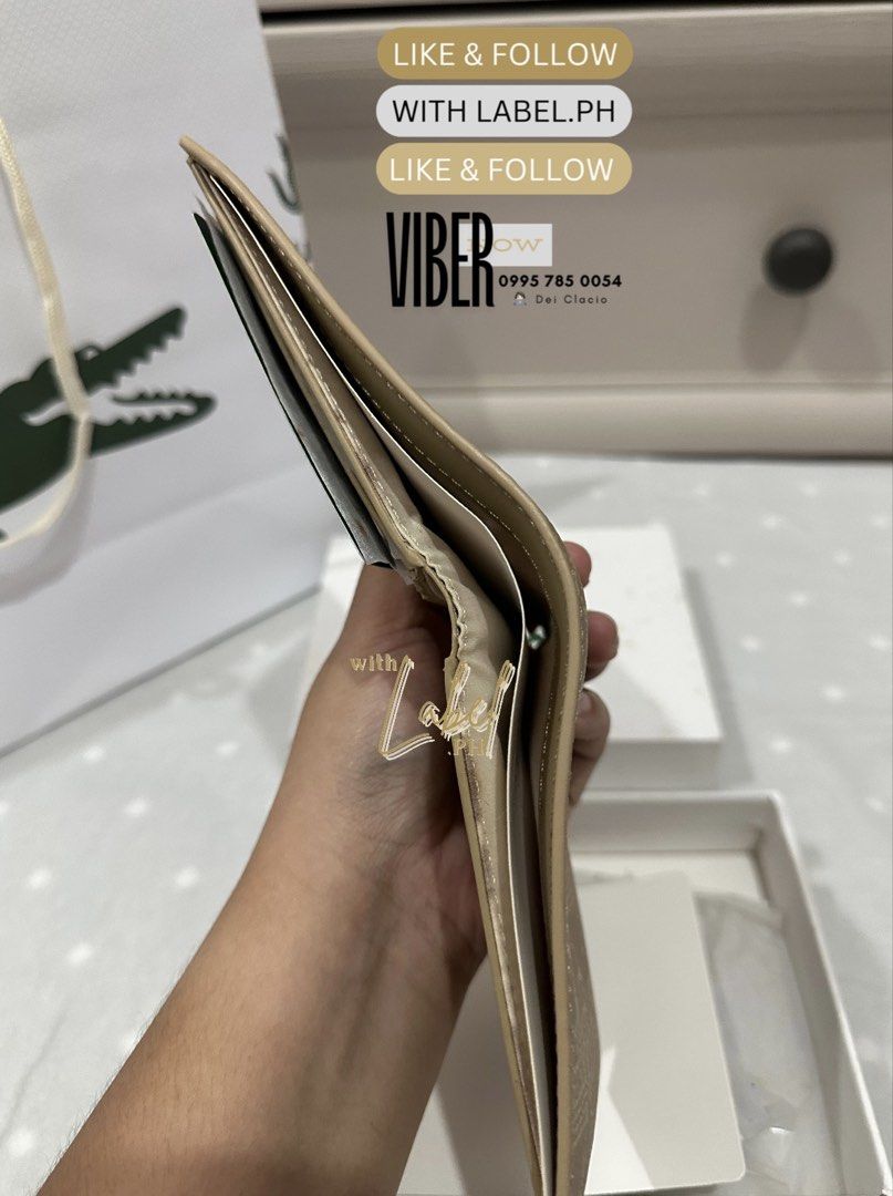 Lacoste Men's Monogram Leather Bifold Wallet (Category: Wallets & Card Holders) located in Manila. Submitted by deiclacio_ (Listing ID 1465802183, Image 2). Description: discoloration .
