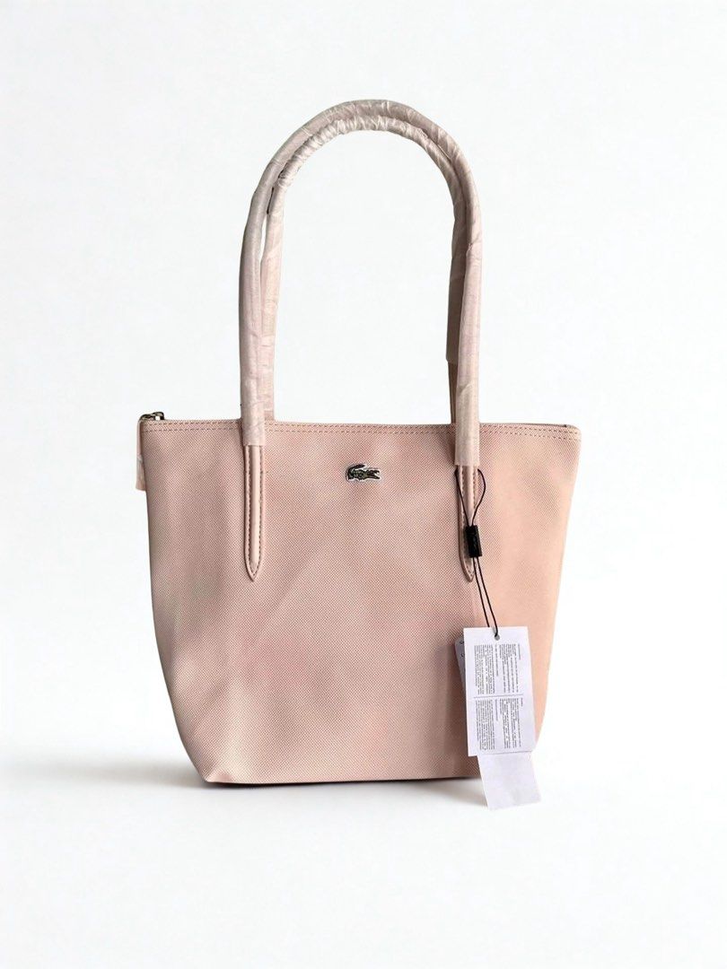 Lacoste Pink Vertical Tote Bag (Category: Tote Bags) located in Mandaluyong City. Submitted by bayline999 (Listing ID 1465771840, Image 1). Description: .