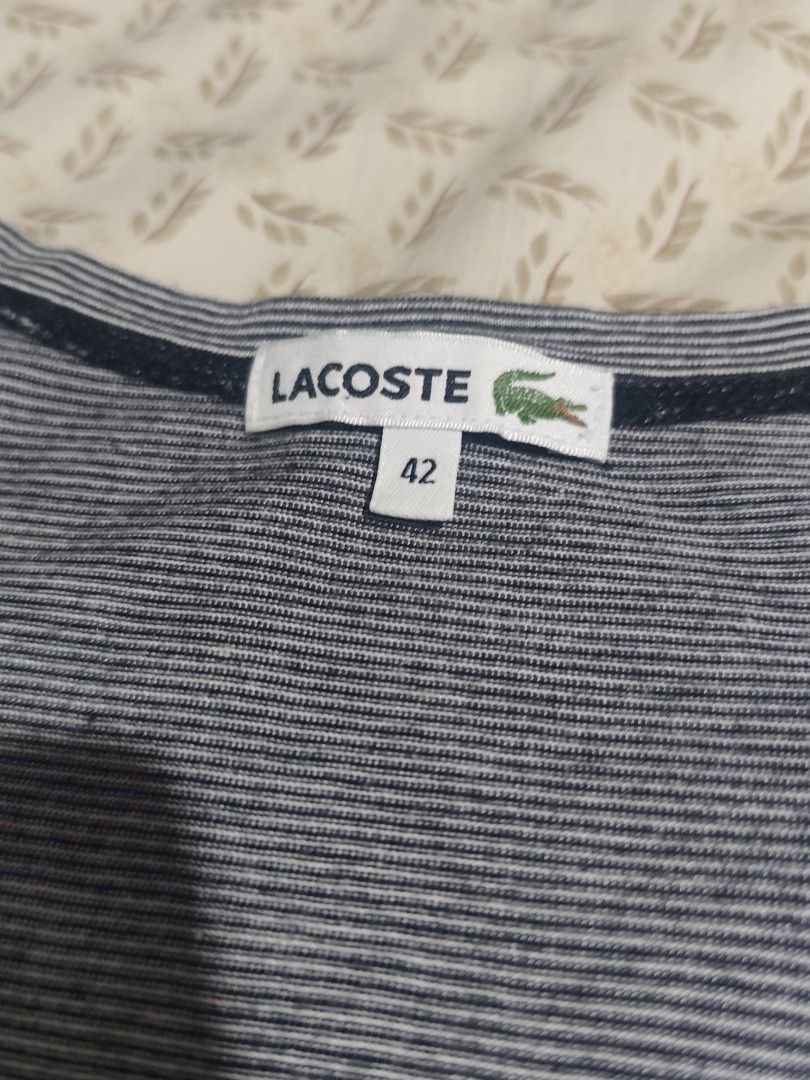 LACOSTE SLEEVELESS (Category: Sleeveless) located in Cagayan de Oro. Submitted by rhenegadgude (Listing ID 1465802972, Image 3). Description: PLEASE CHECK PHOTOS ADD SHIPPING .