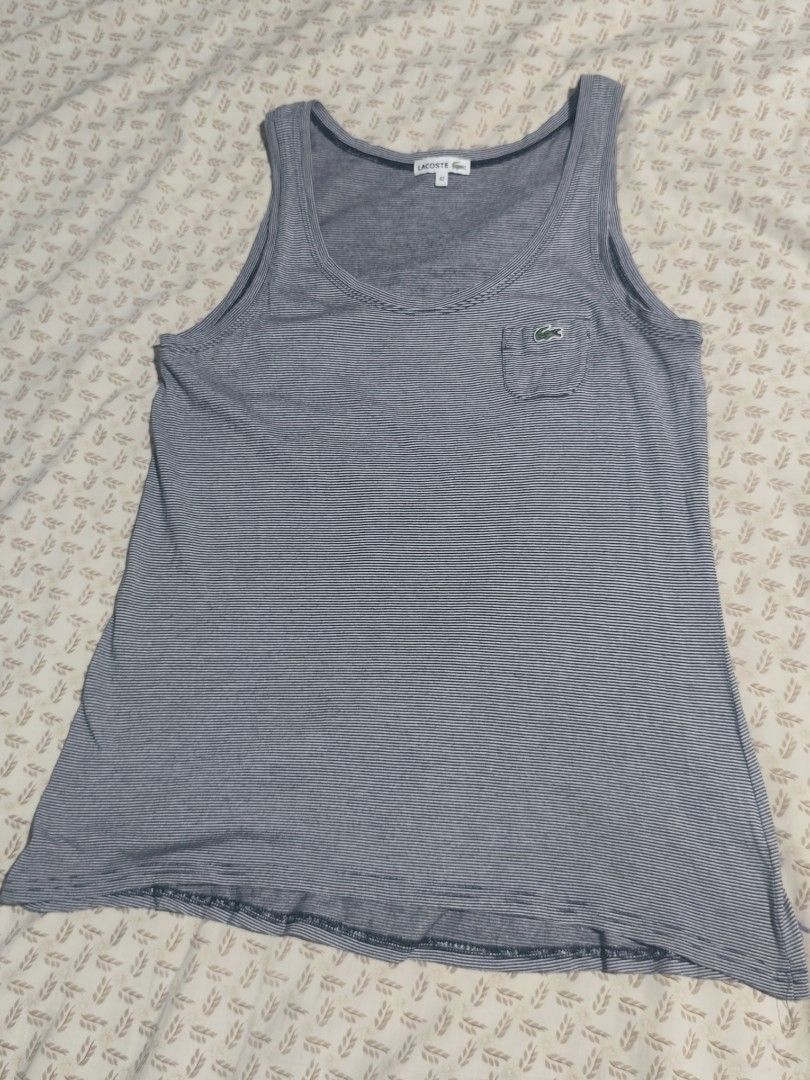 LACOSTE SLEEVELESS (Category: Sleeveless) located in Cagayan de Oro. Submitted by rhenegadgude (Listing ID 1465802972, Image 1). Description: PLEASE CHECK PHOTOS ADD SHIPPING .