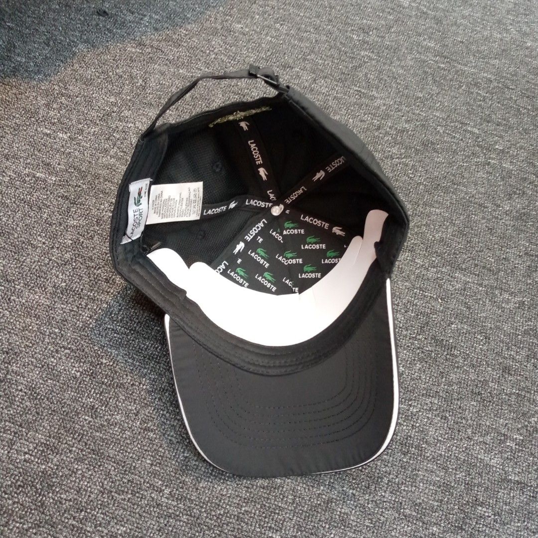 Lacoste Sport Black Cap with Graphic Logo (Category: Caps & Hats) located in Manila. Submitted by pablopresk0. (Listing ID 1465834511, Image 3). Description: - Brand: Lacoste Sport - Color: Black with lime green embroidery and white brim piping - Features: Bold front graphic, adjustable strap with metal buckle, branded inner taped seams Manila location📍 Pm if Interested📩.