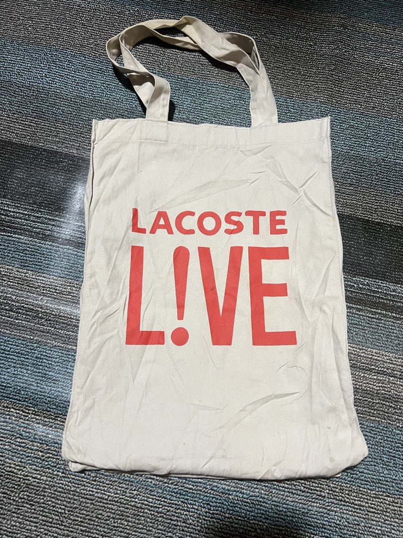 Lacoste tote bag (Category: Tote Bags) located in Cebu City. Submitted by mark24anth29233 (Listing ID 1465897110, Image 2). Description: Original Details are posted Excellent condi Washable stain.