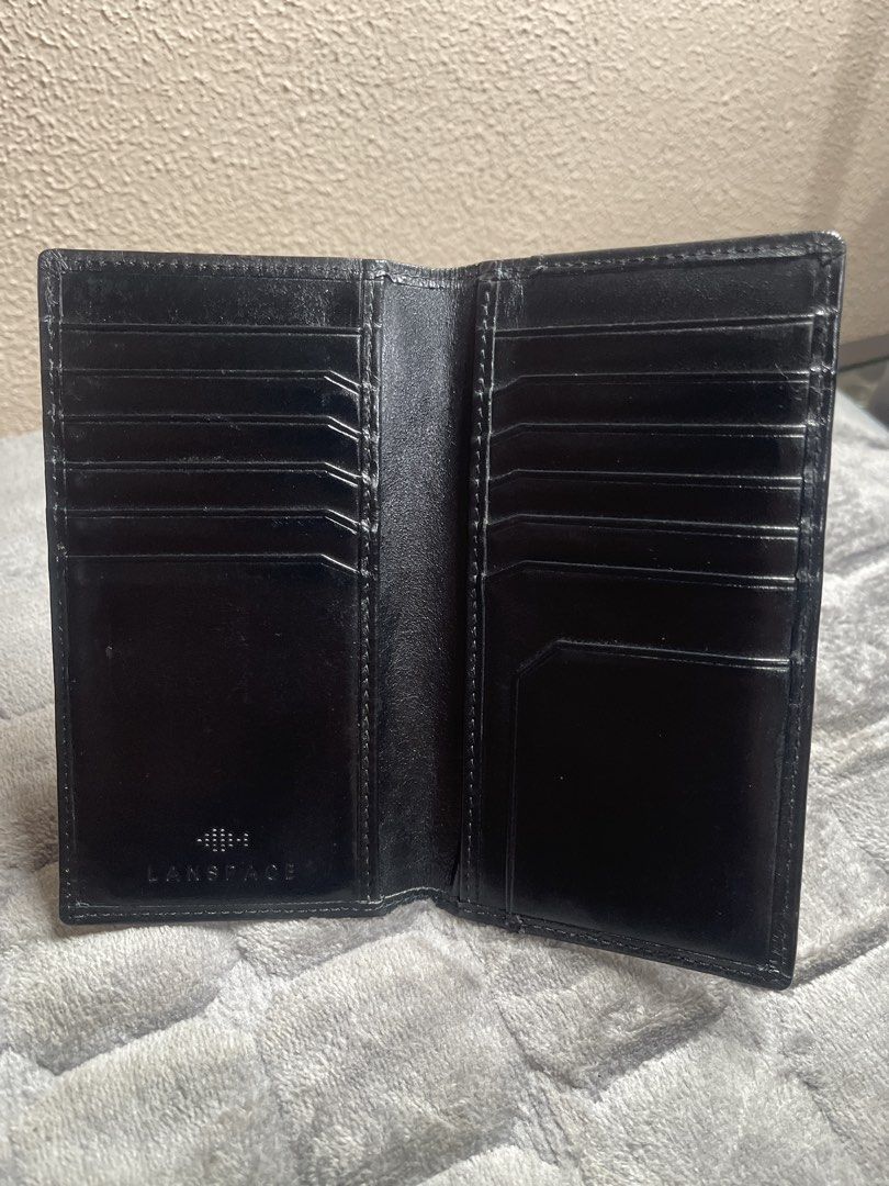 Lanspace Black Leather Long Wallet Card Holder (Category: Wallets & Card holders) located in Quezon City. Submitted by donnabelle7572 (Listing ID 1465933272, Image 3). Description: - Brand: Lanspace - Material: Black genuine leather - Condition: Clean interior and exterior, well-maintained structure - Storage: Plenty of card slots on both sides - Lining: Stylish patterned fabric in the bill compartment - Ideal for: Everyday organization of cards 