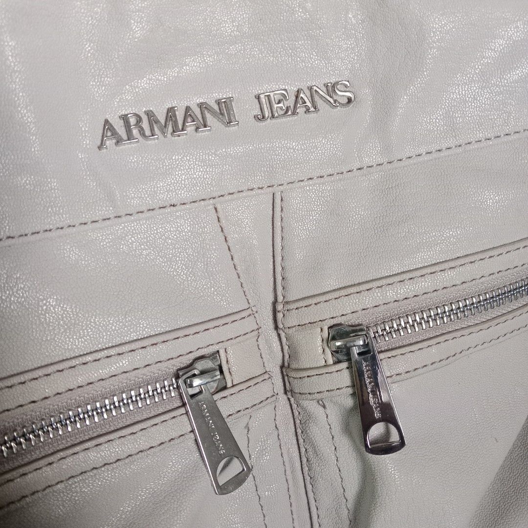 Large Shoulder Bag (Category: Shoulder Bags) located in Manila. Submitted by mamapards17 (Listing ID 1465805483, Image 2). Description: AR--MAN--I Jeans shoulder bag featuring dual front zippered pockets, side slip pockets and silver-tone hardware branding..