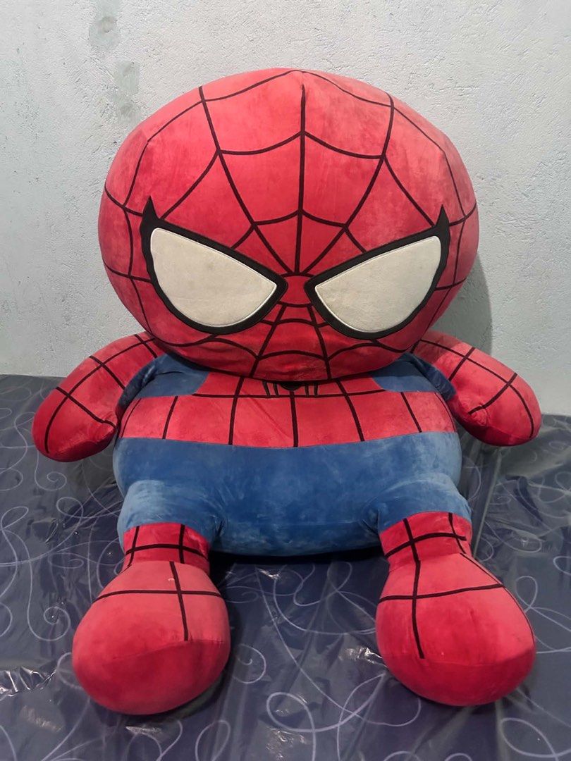 Large Spider-Man Plush Toy Stuffed Doll (Category: Plushies & Soft Toys) located in Quezon City. Submitted by luckyus123 (Listing ID 1465809439, Image 1). Description: - Big Spider-Man plush toy with signature red and blue suit - Features a large round head and oversized white eyes - Detailed black web printing across the body - Very soft, chubby, and huggable build - Great size for cuddling or as a cushion on your bed - Perfect gift for Marvel f