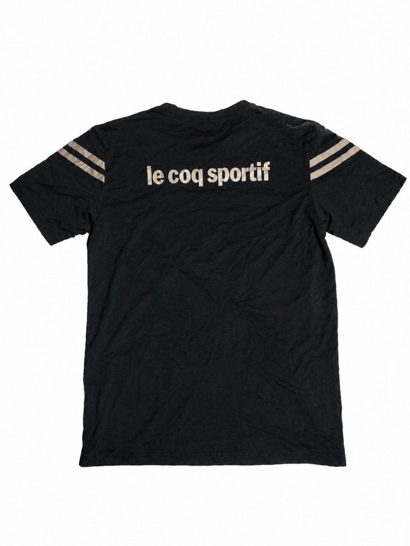 le coq sportif drifit (Category: Activewear) located in Iligan City. Submitted by jydsale. (Listing ID 1465898078, Image 2). Description: 🖤 LE COQ SPORTIF DRI-FIT SHIRT 🐓 🖤 Classic black color 🤍 Signature Le Coq Sportif logo on the chest ✨ Golden double stripes on both sleeves 🔤 Golden “Le Coq Sportif” print on the back 👕 Classic crew neck design 💨 Dri-Fit material — lightweight & comfortable 🔥 Simple, sporty, and timeless look 💯 Perfect