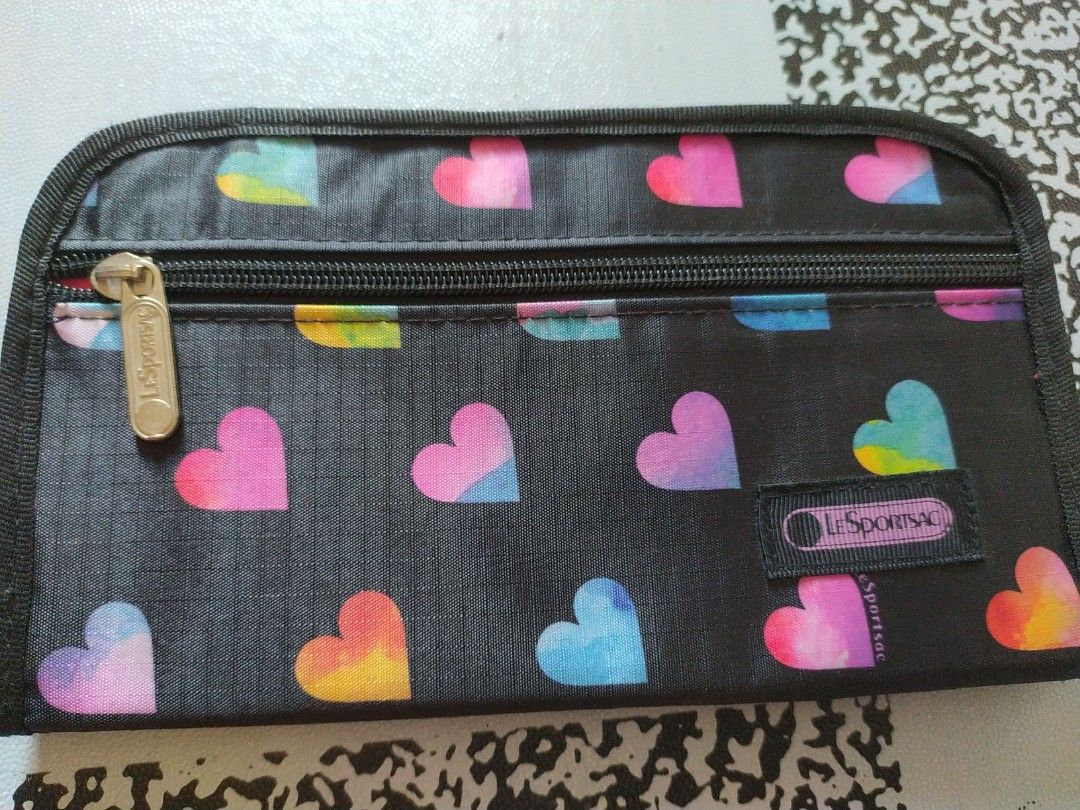 Le sportsac long wallet (Category: Wallets & Card holders) located in Manila. Submitted by timtam04 (Listing ID 1465826232, Image 1). Description: .