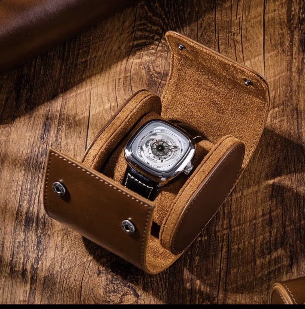 Leather Watch Roll Travel Case Storage Box (Category: Accessory Holder, Box & Organizers) located in Quezon City. Submitted by KaelClay (Listing ID 1465775986, Image 2). Description: - Premium portable watch roll case for travel and home storage - Soft suede interior lining prevents scratches and damage - Secure snap button closures for peace of mind - Includes individual removable pillows for multiple watches - Suitable for both automatic and qu