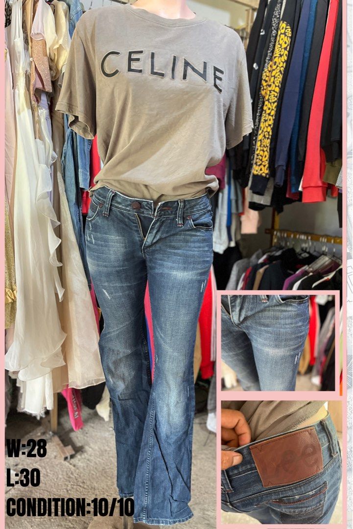 Lee Denim Jeans Flare Bootcut W28 L30 (Category: Jeans) located in Brookes Point. Submitted by grandfish.2f86fc (Listing ID 1465765561, Image 1). Description: - Brand: Lee - Wash: Classic blue with subtle fading and whiskering - Style: Flare bootcut leg with low-rise fit - Details: Button and zip fly, contrast stitching, brown leather embossed logo back patch - Measurements: Waist 28 inches, Length 30 inches - Material: Sturdy, high-quality denim