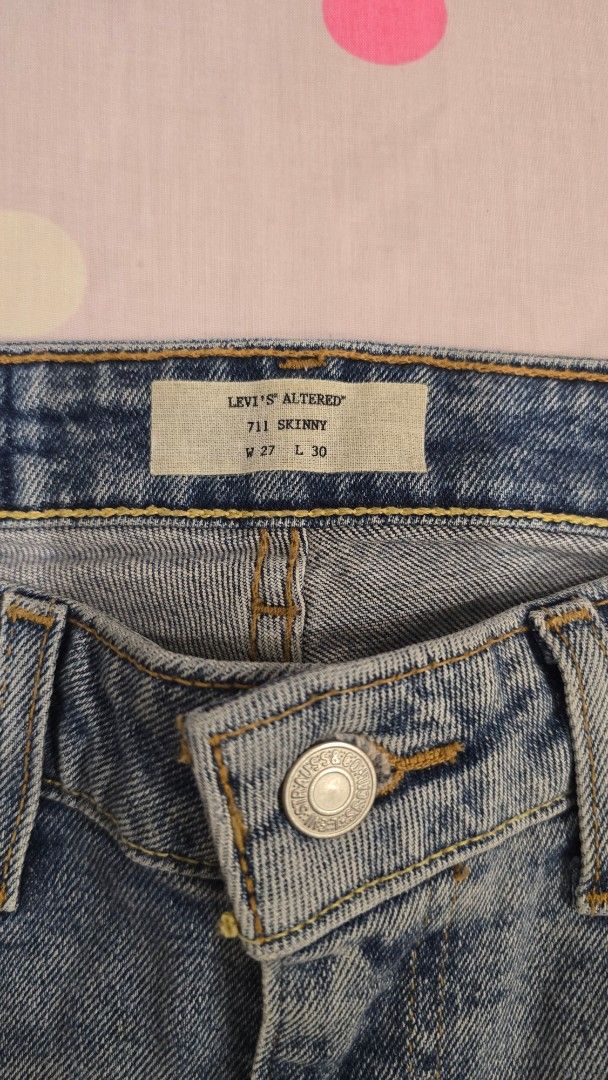 Levi's Skinny Jeans (Category: Jeans) located in Cebu City. Submitted by kitty_12345_ (Listing ID 1465884295, Image 3). Description: - Brand: Levi's - Model: 711 Skinny Altered - Wash: Light wash - Size: W27 L30 - Style: Classic five-pocket design with button fly and signature arcuate back pocket stitching MOP: gcash, mari, maya, gotyme MOD: Lbc, maxim Meetup: Parkmall.