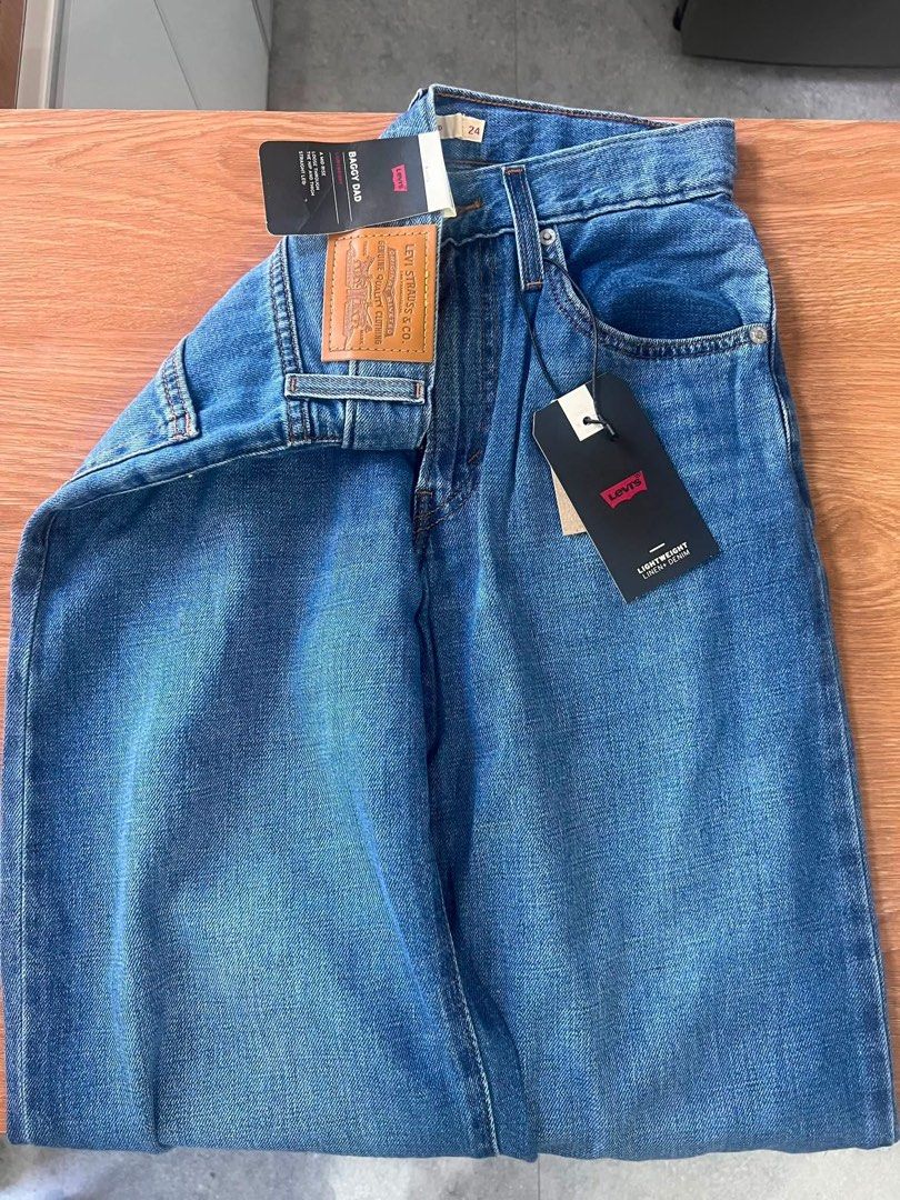 Levi's Baggy Dad Jeans (Category: Jeans) located in Manila. Submitted by mamasavsavi (Listing ID 1464309592, Image 2). Description: - Brand: Levi's - Style: Baggy Dad Jeans - Size: 24 - Material: Lightweight Linen & Denim Blend - Fit: Straight Leg - Perfect for: Casual everyday wear Orig price 4500 BRANDNEW WITH TAG AND PAPER BAG Bought at LEVIS STORE Ganda ng color Super duper ganda as in. Hirap ilet go Kaso Maluwag sa akin .