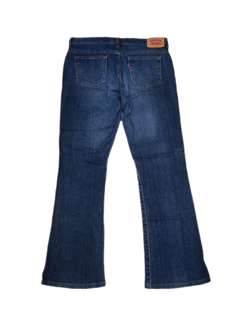 Levi's Boot Cut Denim Jeans Blue (Category: Jeans) located in Manila. Submitted by jaradhiggins24 (Listing ID 1465866661, Image 1). Description: - Brand: Levi's - Style: Boot cut jeans - Wash: Dark blue with heavy fade finish - Fit: Mid-rise with zip fly and button closure - Details: Traditional five-pocket styling, leather brand patch, and iconic red tab - Stitching: Contrast stitching throughout - Condition: Well-maintained and ready to wear - 