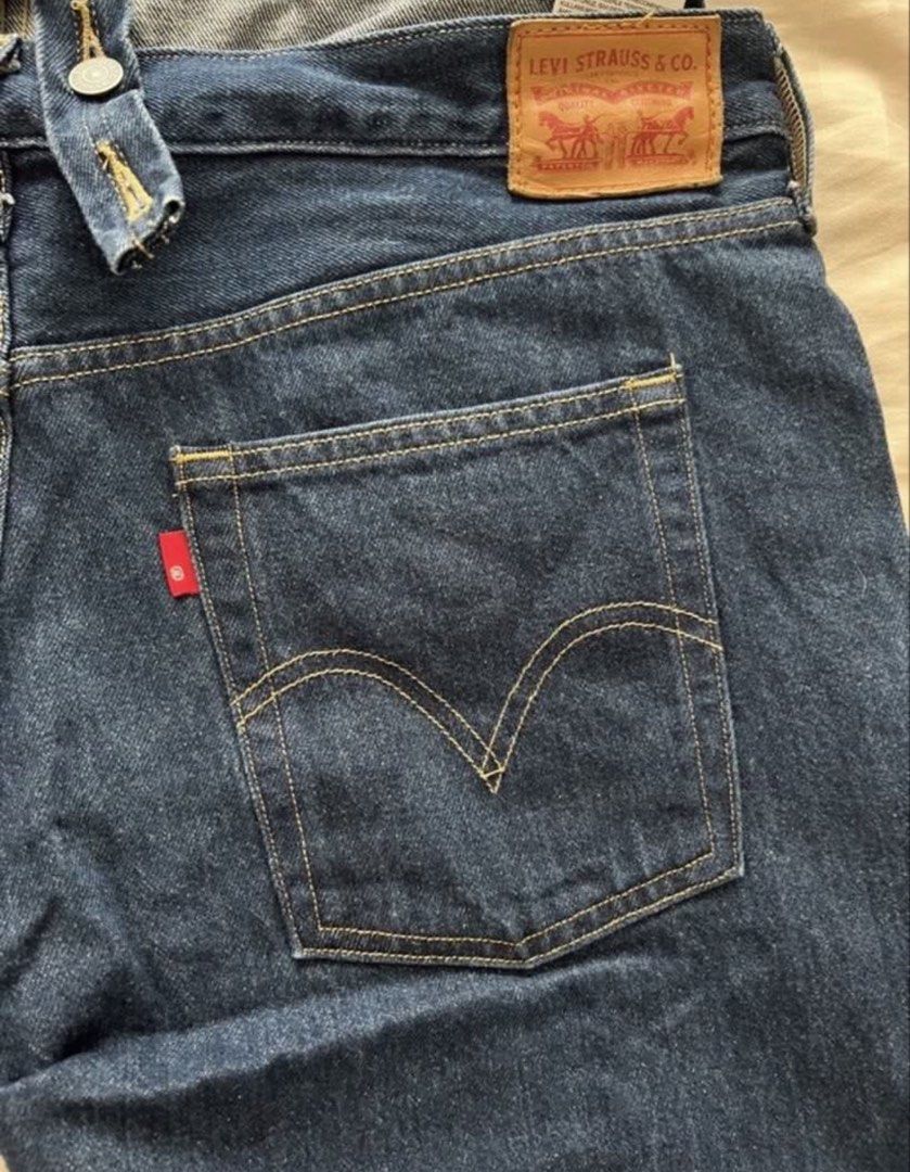 Levi's Denim Overalls Dark Wash (Category: Jumpsuits) located in Pasig City. Submitted by jenscloset86 (Listing ID 1465928869, Image 3). Description: • Levi Strauss & Co. • Classic dark wash denim overalls • Color: Rich indigo • Adjustable cross-back straps, front bib pocket, and multiple utility pockets • Signature red tab, branded metal hardware, and back leather patch • Clean, sturdy, and heavy-duty construction •Perfect forCasual everyday out